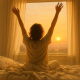 Nježni Buđenje za Sve One Dane Kada se Ne Osjećate Dovoljno Dobro | A soothing sunrise with a person stretching out in bed, surrounded by soft blankets and warm light.