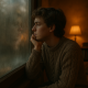 3 Bitne stvari koje treba zapamtiti kada se osjećate zaglavljeni u životu | A person looking thoughtfully out a foggy window, with a cozy room filled with warm light.